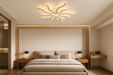 Modern bedroom with a ceiling light fixture, bed, and side tables.